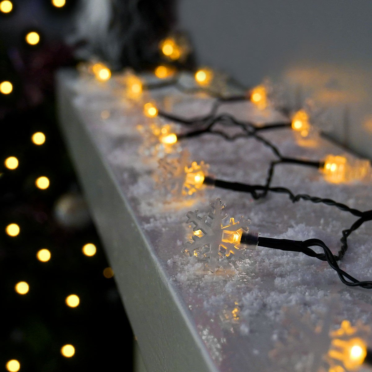 5m Indoor & Outdoor Battery Snowflake Fairy Lights, Warm White LEDs, Green Cable image 4