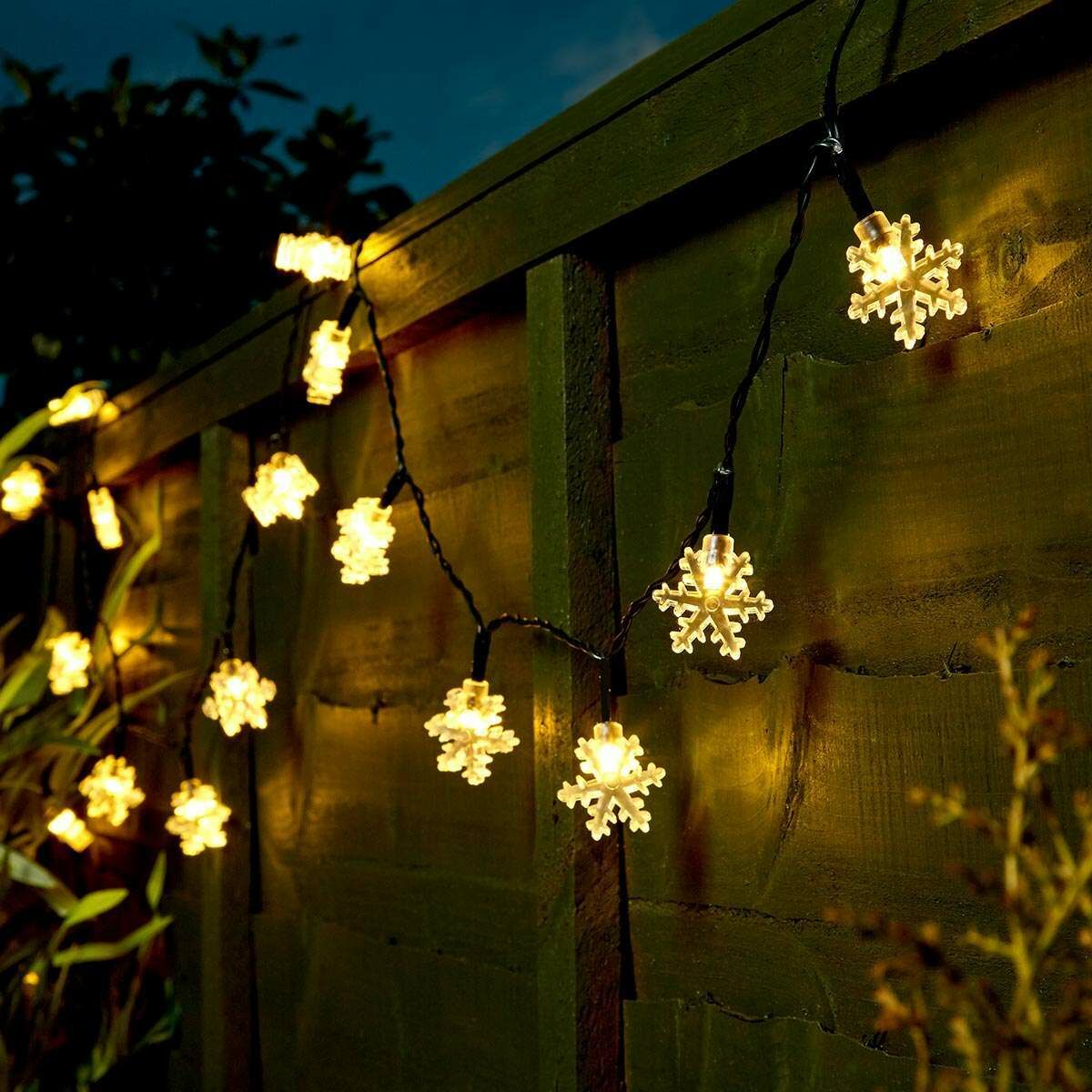 5m Indoor & Outdoor Battery Snowflake Fairy Lights, Warm White LEDs, Green Cable image 1